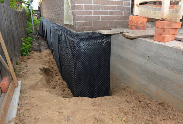 Happy homeowners after waterproofing job in Valley Lee